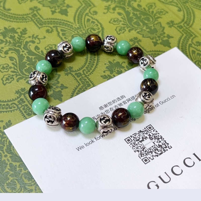 G*u*i bracelets